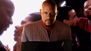Benjamin Sisko with Kasidy Yates and Jake Sisko, highlighting the family relationships at the heart of his journey in Star Trek: Deep Space Nine.