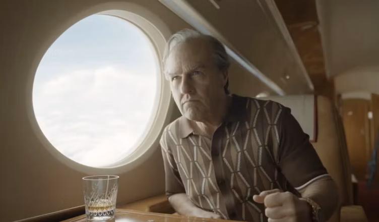 Digger image featuring Tom Cruise as Digger Rockwell sitting aboard a private jet.